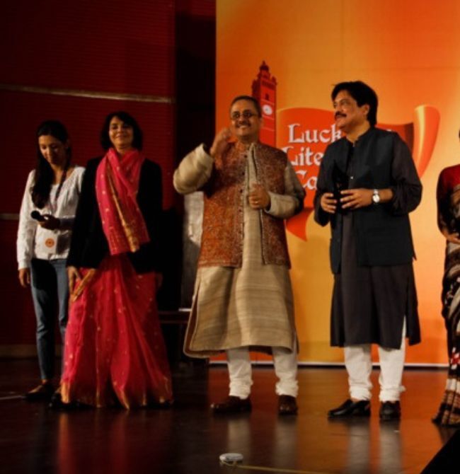 Dignitaries and speakers gathered together on stage at the 2013 edition